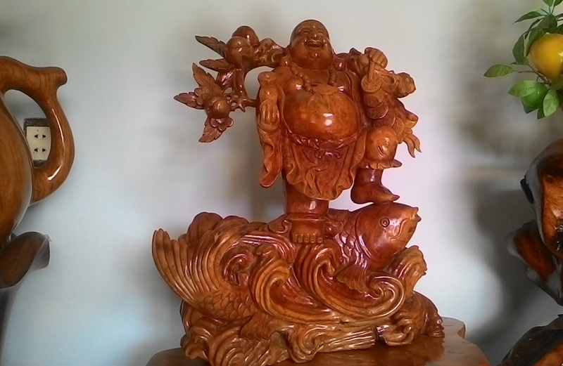 Phật Di Lặc cưỡi cá chép